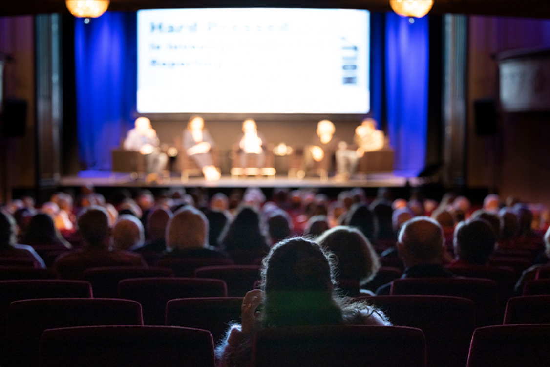 Audience facing the stage